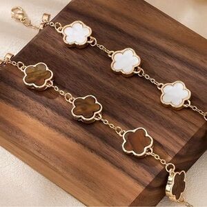 Gold and White Elegant Bracelet with Quatrefoil Design